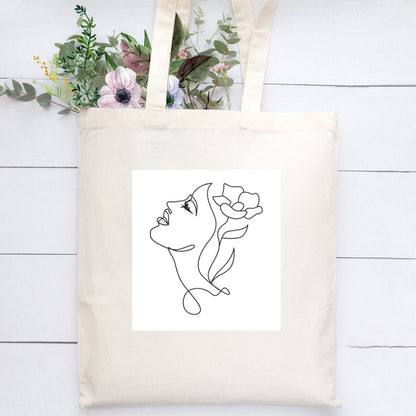 Sacoșă de pânză Kiskedves Line Art: chip cu o floare în păr, pe scânduri albe, cu un buchet.